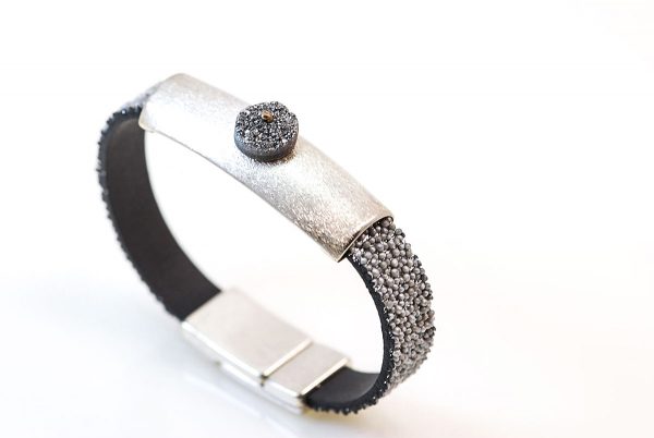 Silver bracelet with aqua aura