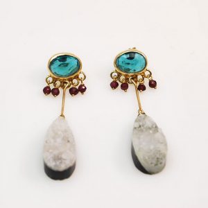 Long gold plated silver earrings with blue quartz