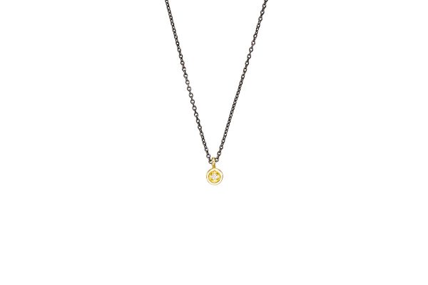 Gold  tiny  pendant with zirgons & silver chain
