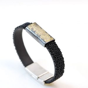Silver  and gold 18k bracelet with ruber wrap